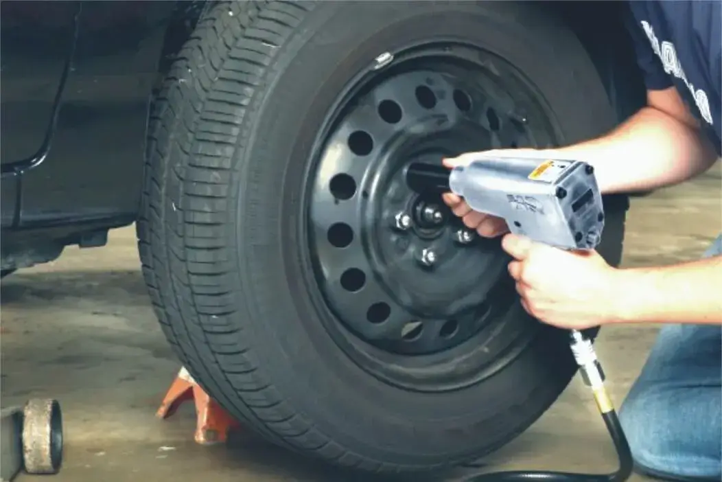 Using Impact Wrench to Remove Car Tyre Nuts